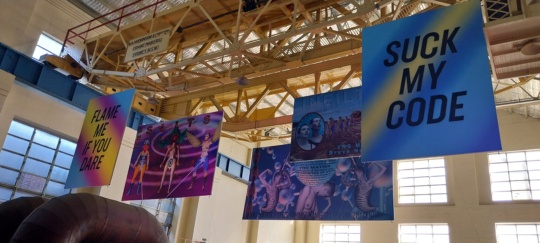 24th Biennale of Sydney, One Thousand Suns, White Bay Power Station, VNS Matrix installation, 5 x banners, billboard, DNA Slits (renamed for 24th Biennale of Sydney from DNA Sluts), Infiltrate, Suck My Code and Flame Me If You Dare - fabric and aluminium.