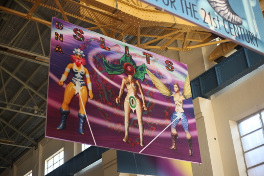 Installation shot, DNA Slits banner, VNS Matrix, Biennale of Sydney, White Bay Power Station 2024