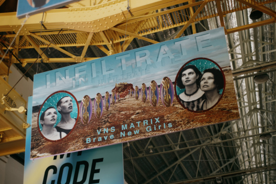 Installation shot, Infiltrate banner, VNS Matrix, Biennale of Sydney, White Bay Power Station 2024